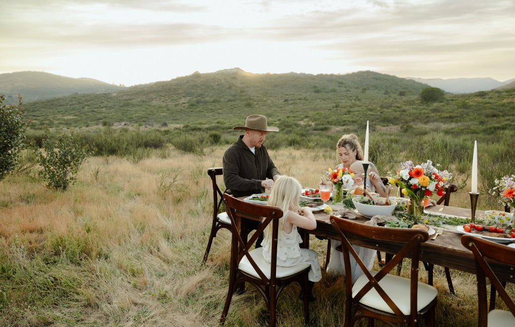 Family sharing a meal together at the dinner table