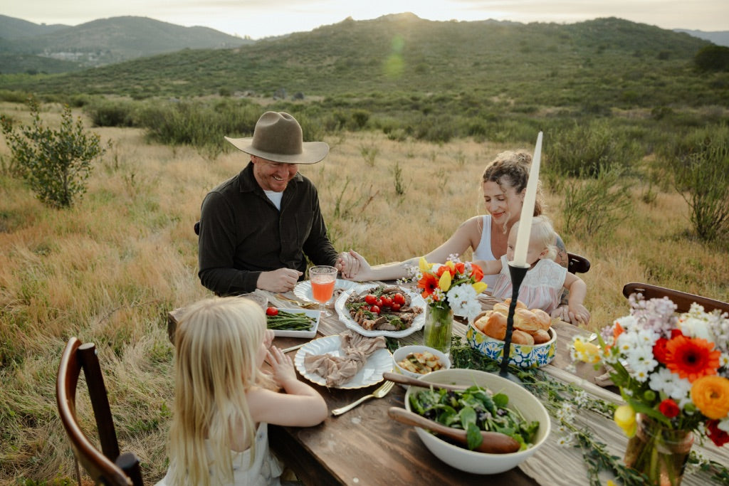 Parker Pastures family enjoying a meal outdoors